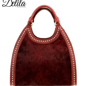 Brand NWT Delilah handbag.